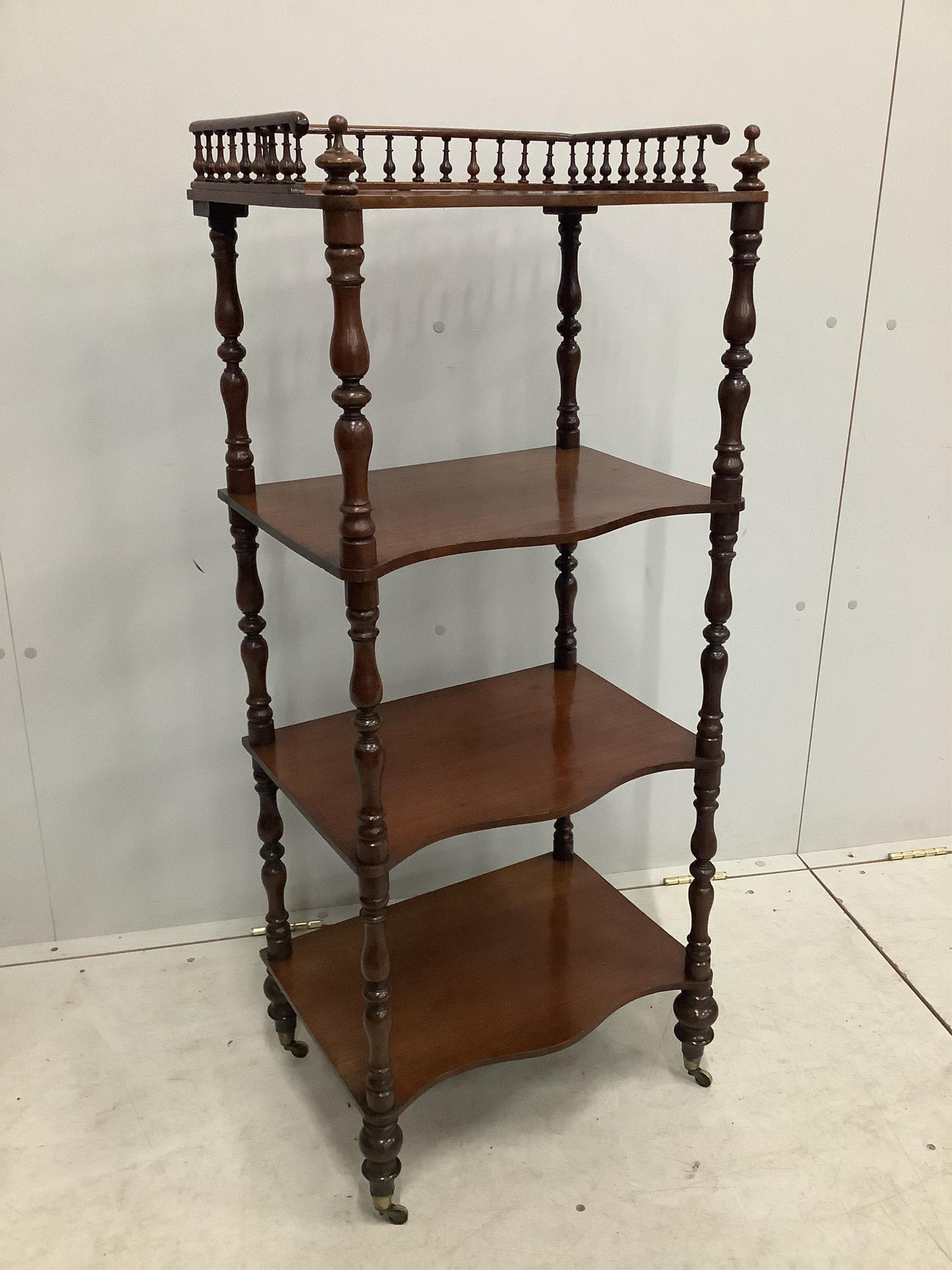 A Victorian four tier mahogany whatnot with a galleried top, width 47cm, depth 33cm, height 113cm. Condition - fair